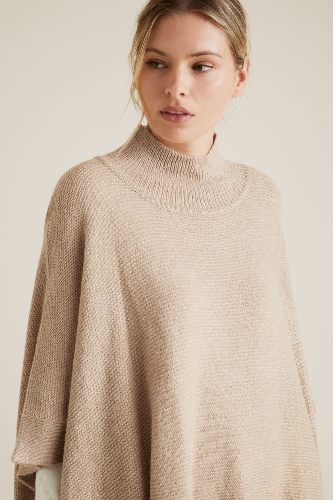 poncho roll neck