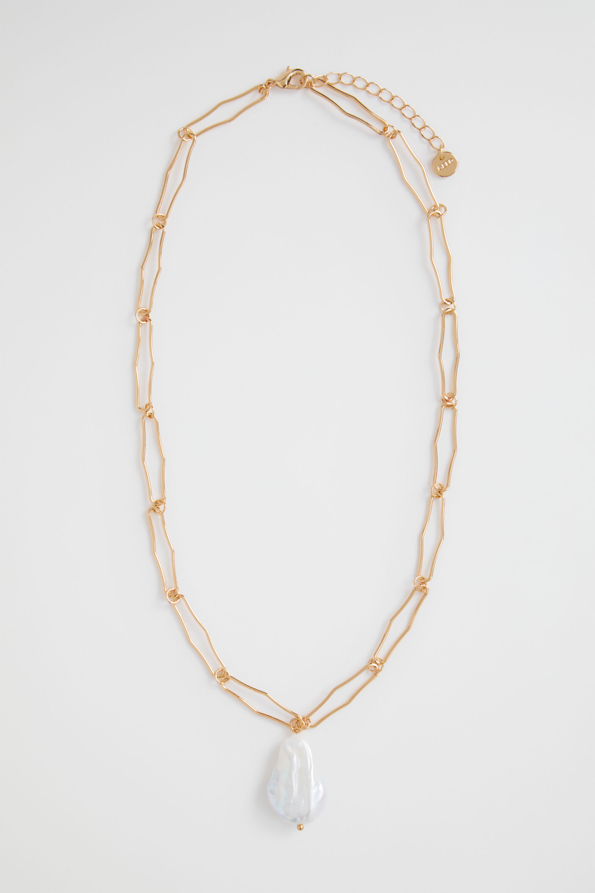 Seed online pearl pendant