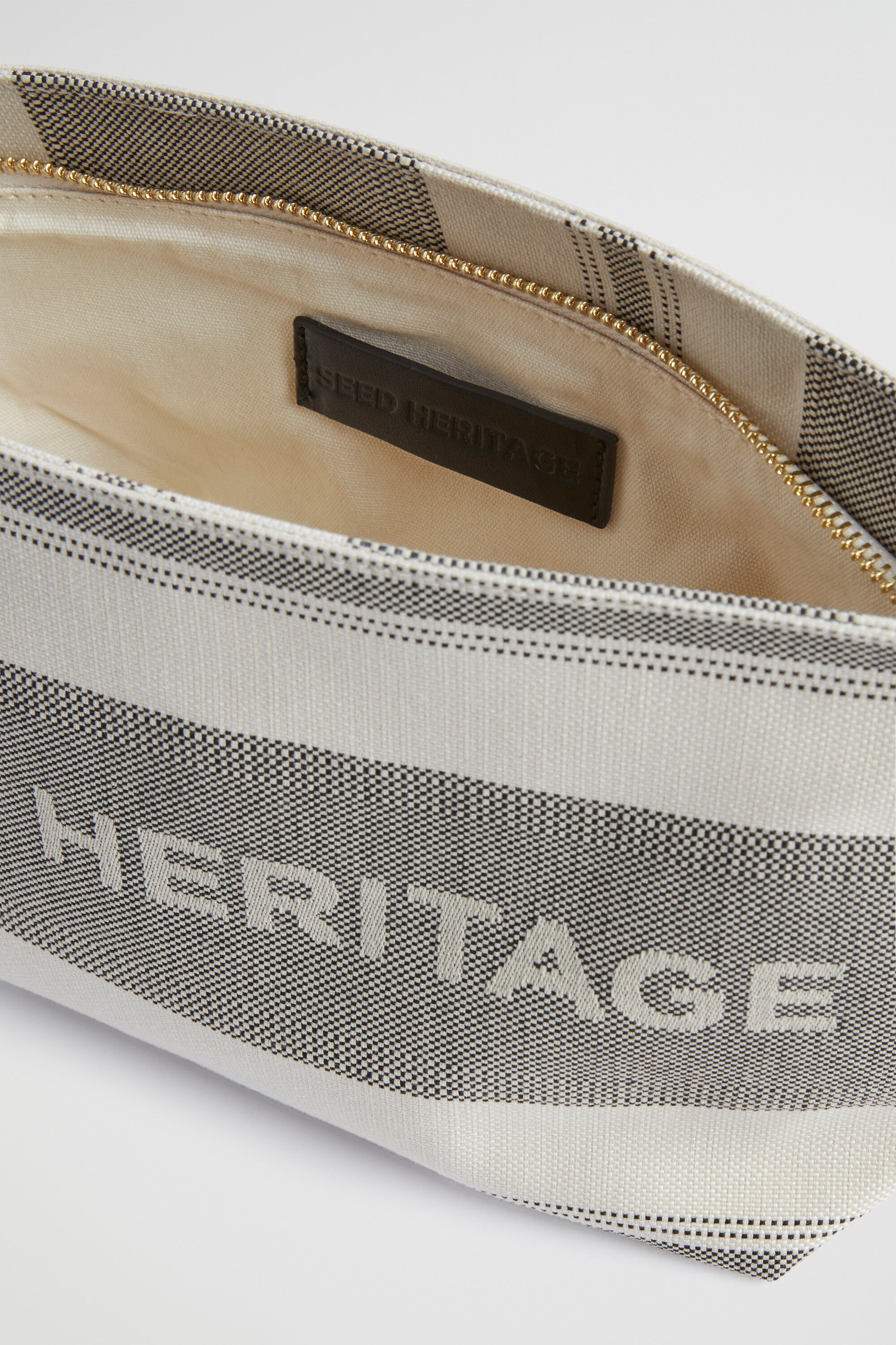 Burberry heritage stripe wristlet bag clearance