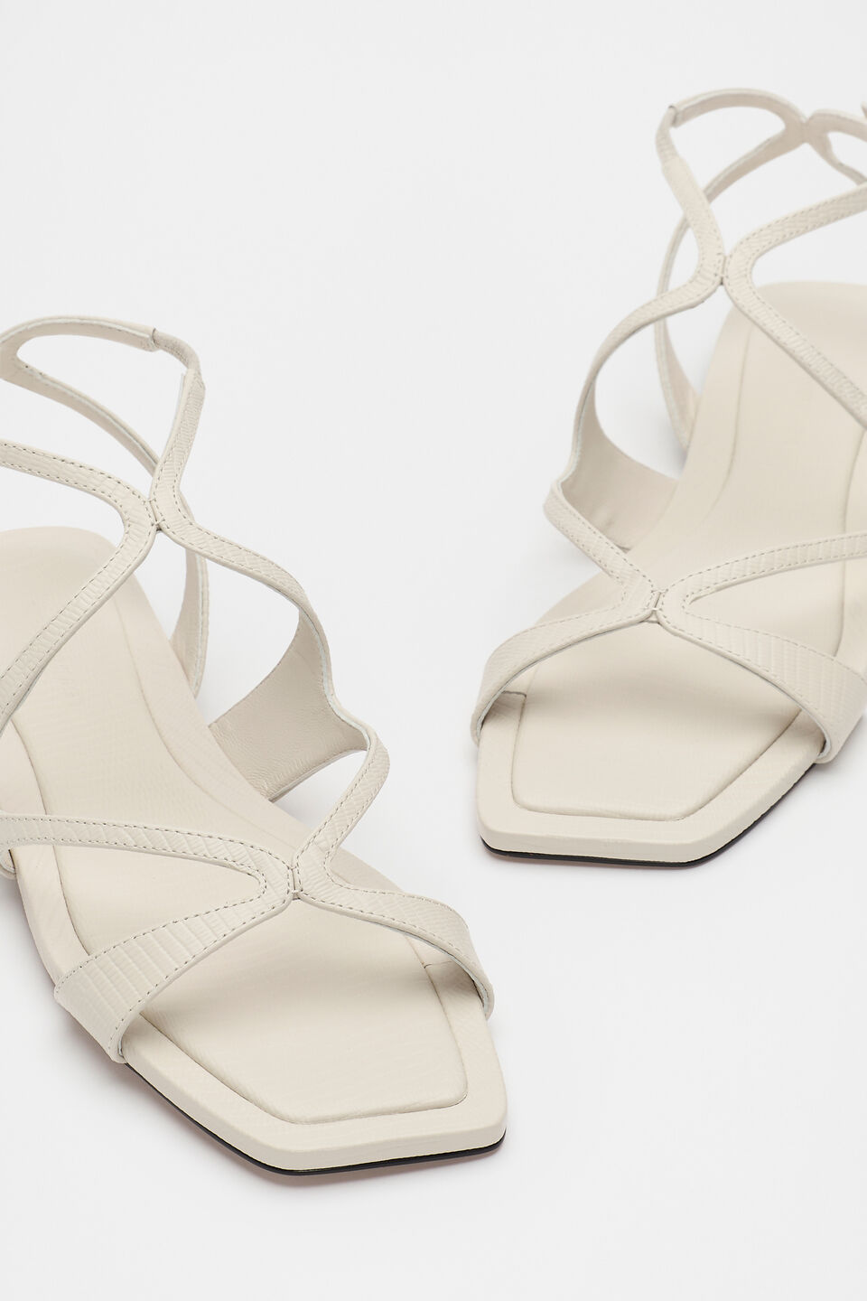 Deven Curved Strap Sandal  Tofu Embossed